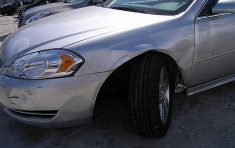 Silver Impala Fender Damage Before